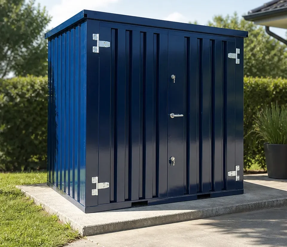Blue flat-pack storage container on an outdoor property site